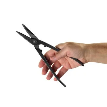 Objects tool hands action - Hand scissors for cutting metal worker. Isolated Stock Photos