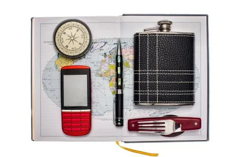 Objects for travel isolated on white background: compass, mobile phone, pen, Stock Photos