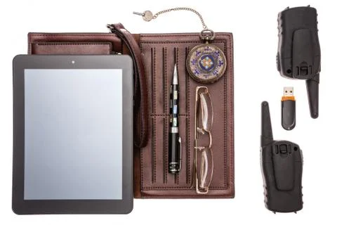 Objects for the traveler: a tablet, a flash drive, a watch, glasses, a pen, a Stock Photos