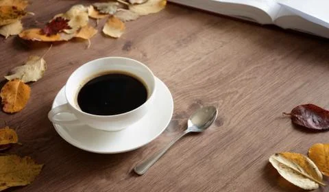 Objects on a wooden table a cup of coffee Stock Photos