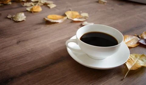 Objects on a wooden table a cup of coffee Stock Photos