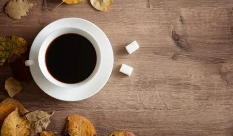 Objects on a wooden table a cup of coffee Stock Photos