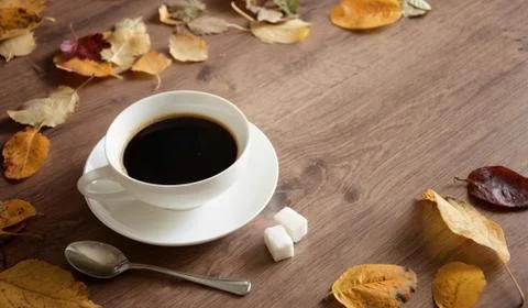 Objects on a wooden table a cup of coffee Stock Photos