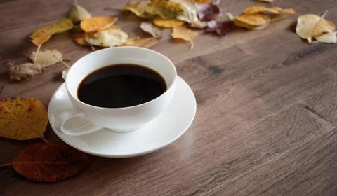 Objects on a wooden table a cup of coffee Stock Photos