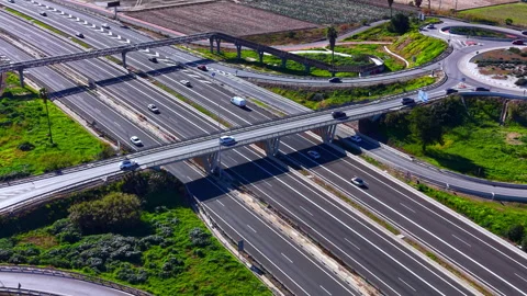 Oblique aerial view of complex highway interchange system Stock Footage 334860429