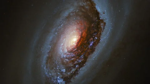 Oblique angle view of a helical galaxy in outer space Video stock 154428190