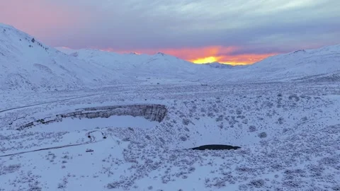 Oblique drone forward flyover above Pozo de las Animas at winter sunset, Mendoza Stock Footage 341553260