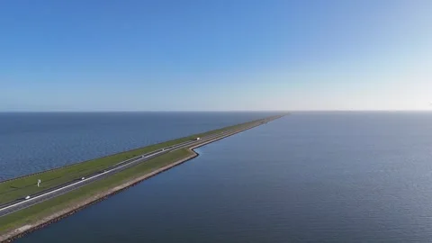 Oblique morning view of the full Afsluitdijk from island Stock Footage 331838457