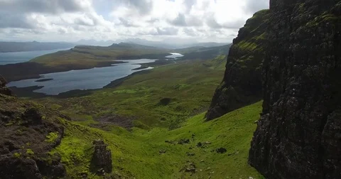 Oblivion-esque Cliff Mountain Valley | Scotland 4K Drone Stock Footage 82217844