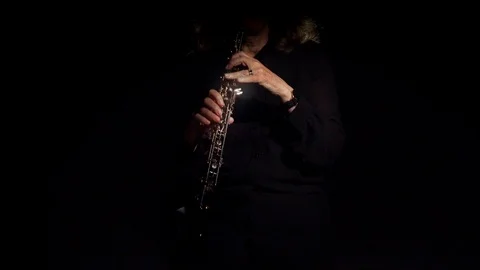 Oboe Player in the Shadows Video stock 111935418