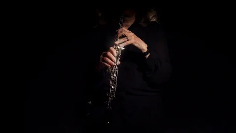 Oboe Player in Shadows Video stock 111937565