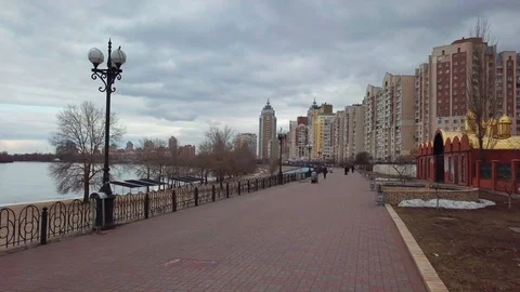 Obolon quay with dnipro river on background and Ukrainian flag Stock Footage 104424438