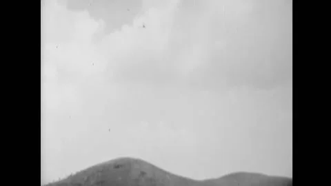 OBONG-NI - 1950 - Planes drop bombs, and they explode on hills in Obong-Ni, Stock Footage 280068816