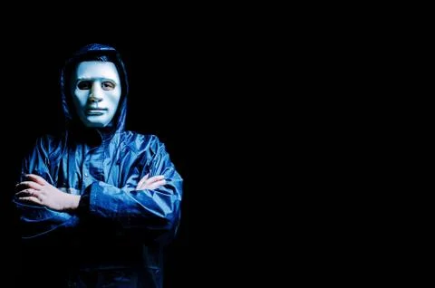 Obscured dark face. Data thief, darknet and cyber security concept Stock Photos