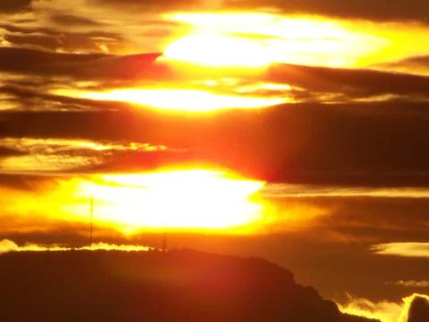 Obscured sunset Stock Photos