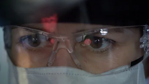 Observation of coronovirus in a protective mask Stock Footage 126707116