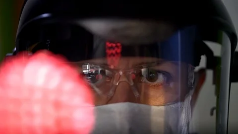 Observation of coronovirus in a protective mask Stock Footage 126707117