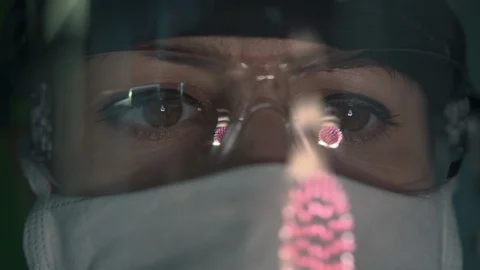 Observation of coronovirus in a protective mask Stock Footage 126915848