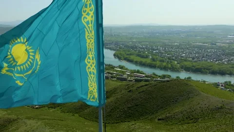 Observation deck of city of Ust-Kamenogorsk with the flag of Kazakhstan flying d Stock Footage 242555340