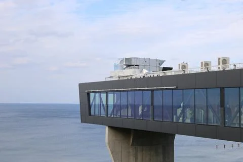 Observation deck with elevator lift, panoramic platform on sea view. Stock Photos