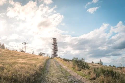 Observation deck lookout tower called Milada near Orlik dam in evening light Foto stock