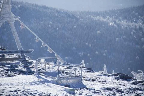An observation deck in the mountains. Snow-capped mountains. Stock Photos