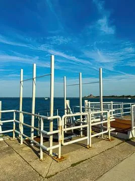 Observation deck on rooftop with safety railing and city view Stock Photos