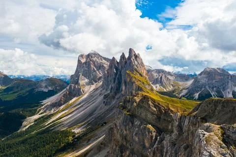 Observation point overlooking bare peak of Seceda mountain Stock Photos