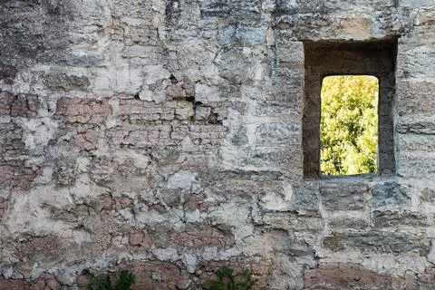 Observation port on a stone wall Stock Photos