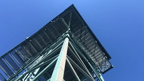 Observation tower metal construction and blue sky. Stairway of the watch tower Video stock 122358829