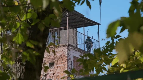 Observation tower in the prison. The warden monitors the prisoners Stock Footage 252281055