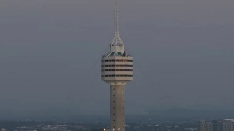 Observation tower rotating restaurant at dusk 스톡 동영상 330338735