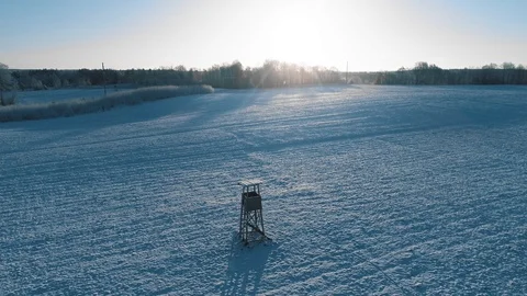 Observation watchtower in winter fields, aerial view Video stock 105420990