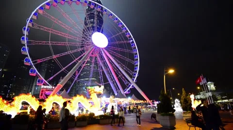 Observation wheel and the IFC2 building, Hong Kong, China. Stock Footage 59766742
