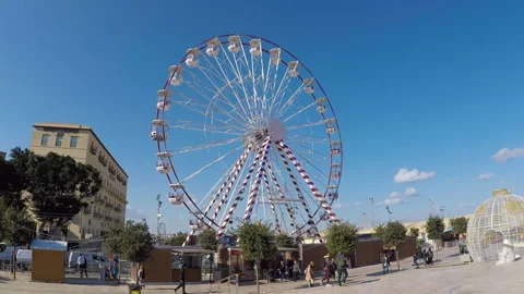 The observation wheel, located on the periphery of the City Gate of Valletta Stock Footage 297005887