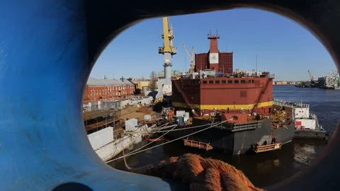 Observation of the working process on the ship from the pipe of another ship Stock-Footage 92626087