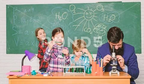 Observe reaction. Science is always the solution. School chemistry experiment Stock Photos
