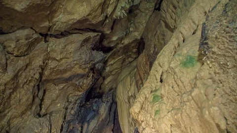 Observing a beautiful waterfall in a cave Stock Footage 76079756