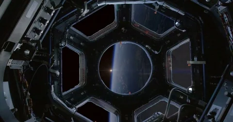 Observing a Earth Hurricane Sunrise Through Space Station Windows 4K Video stock 76142945