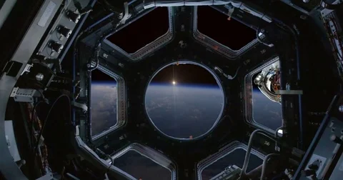 Observing Earth Sunrise Through Space Station Windows and Astronaut  Stock Footage 76143704