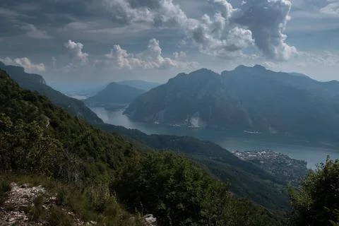 Observing the lake Como from the mountain when going for a hike Stock Photos