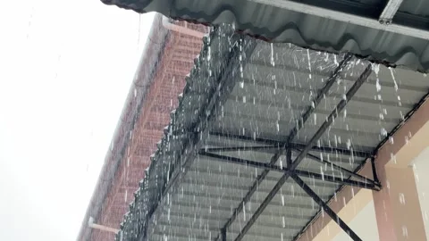 Observing Rain Fall on a Covered Urban walkway Stock Footage 325292294