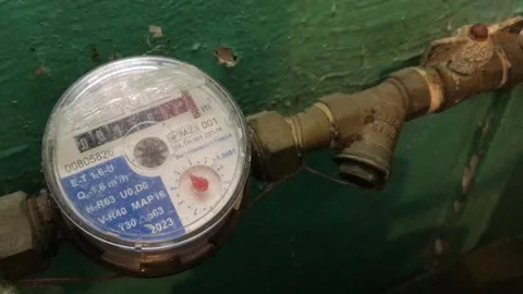 Observing a water meter in a residential setting Stock Footage 308367942