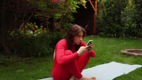 Obsessively checking news on phone Stock Footage 336780696