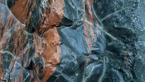 Obsidian stone background, stone wall background Stock Photos