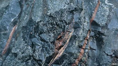 Obsidian stone background, stone wall background Stock Photos