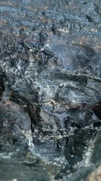 Obsidian stone background, stone wall background Stock Photos