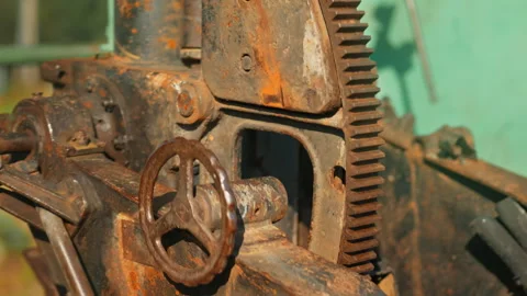 Obsolete, abandoned, and rusted combat units with aiming levers stand amids.. Stock Footage 345599070