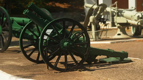Obsolete, abandoned, and rusty combat guns stand amidst the natural landsca.. Stock-Footage 346324110