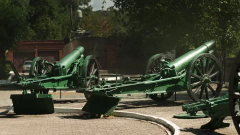 Obsolete, abandoned, and rusty combat guns stand amidst the natural landsca.. Stock-Footage 346325559